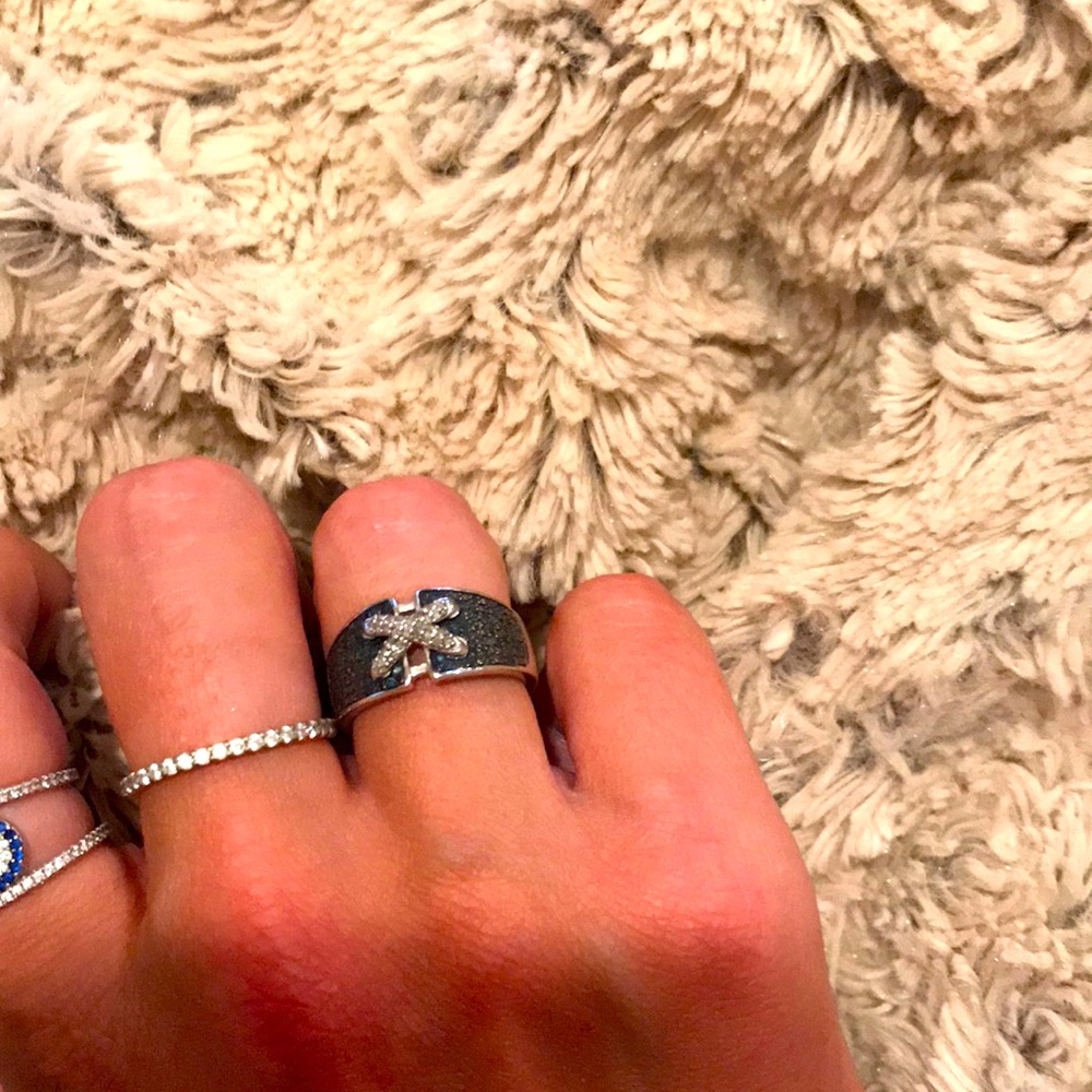 Unique Crystal X detail ring with teal stones